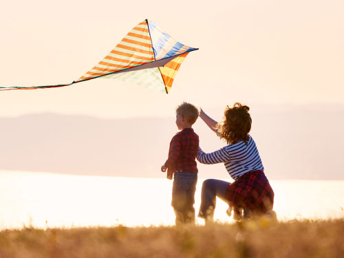 mother with child and kite mother with child and kite